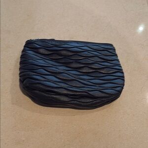 Laura Mercier cosmetic pouch textured black. Never used.